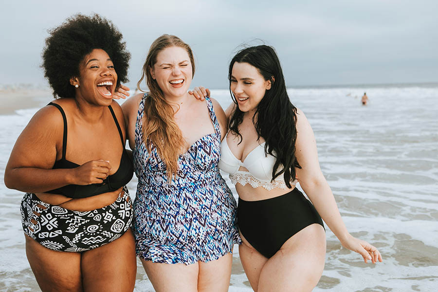 women enjoying the beach